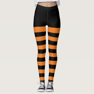 Glückliche gestreifte Leggings Halloweens