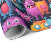 Glückliche Gruppe farbenfroher Monster auf schwarz Geschenkpapier (Rolleneckpunkt)