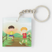 Glückliche Kinder spielen draußen Schlüsselanhänger (Rückseite)