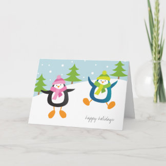 Glückliche Pinguine im Schnee frohe Feiertage Feiertagskarte
