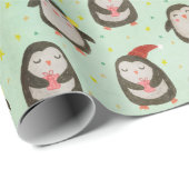 Glückliche Pinguine mit Weihnachtsmannmützen und O Geschenkpapier (Rolleneckpunkt)