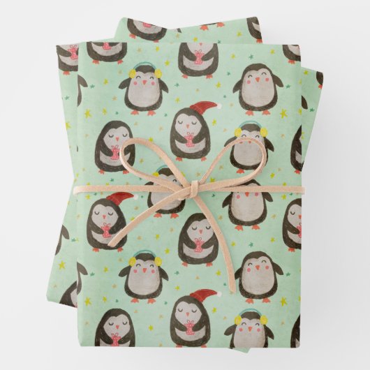Glückliche Pinguine mit Weihnachtsmannmützen und O Geschenkpapier Set (Beispiel)