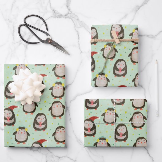 Glückliche Pinguine mit Weihnachtsmannmützen und O Geschenkpapier Set (Vorderseite)