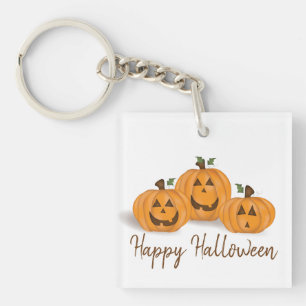 Glückliche und lächelnde Jack O Lanterns Schlüsselanhänger