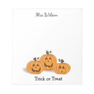 Glückliche und lächelnde Kürbislaternen Notizblock