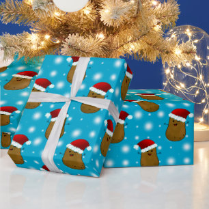 Glückliche Weihnachtskartoffeln mit Weihnachtsmann Geschenkpapier