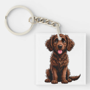 Glücklicher Cartoon Lockenhund-Welpe lächelnd Schlüsselanhänger