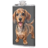 Glücklicher Dachshund-Welpe Flachmann (Links)
