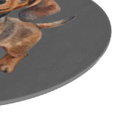 Glücklicher Dachshund-Welpe Schneidebrett (Ecke)