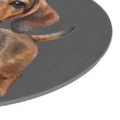 Glücklicher Dachshund-Welpe Schneidebrett (Ecke)