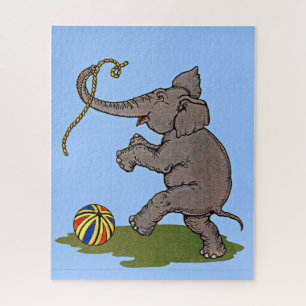 glücklicher Elefant, der mit Seil und Ball spielt Puzzle
