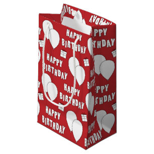 Glücklicher Geburtstag mit Balloons rotem Hinterg Kleine Geschenktüte