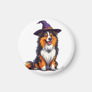 Glücklicher Hund mit einem Hexenhut Magnet