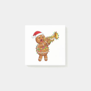 Glücklicher Lebkuchen-Musiker spielt Trompete Weih Post-it Klebezettel