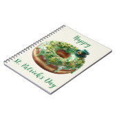 Glücklicher St. Patrick's Day Donut mit Leprechaun Notizblock (Linke Seite)