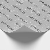 GLÜCKLICHER URLAUB Text in Schneeflocken Geschenkpapier (Ecke)