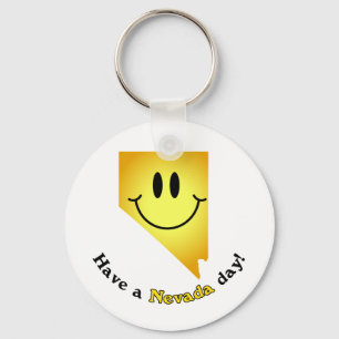 Glückliches Gesicht - haben Sie einen Nevada-Tag! Schlüsselanhänger