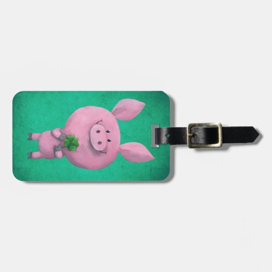 Glückliches Schwein mit glücklichem vierblättriges Gepäckanhänger (Vorderseite horizontal)
