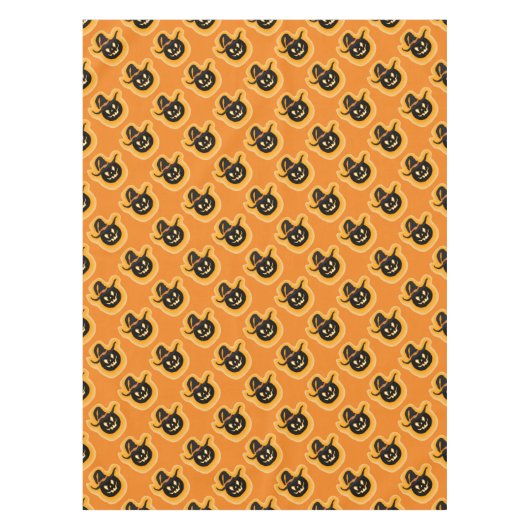 Glühende Kürbishexe auf Orange Tischdecke (Vorderseite)