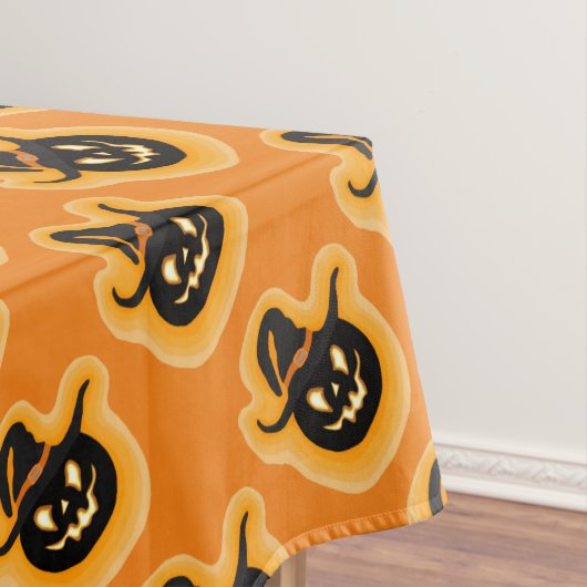 Glühende Kürbishexe auf Orange Tischdecke (Beispiel)