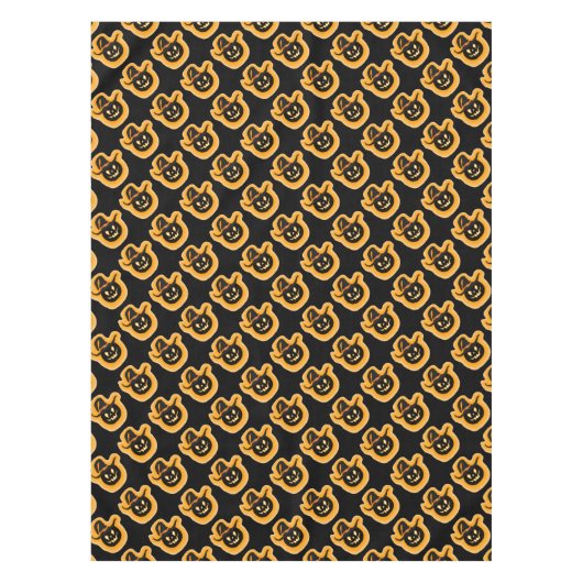 Glühende Kürbishexe auf schwarzem Tischdecken (Vorderseite)