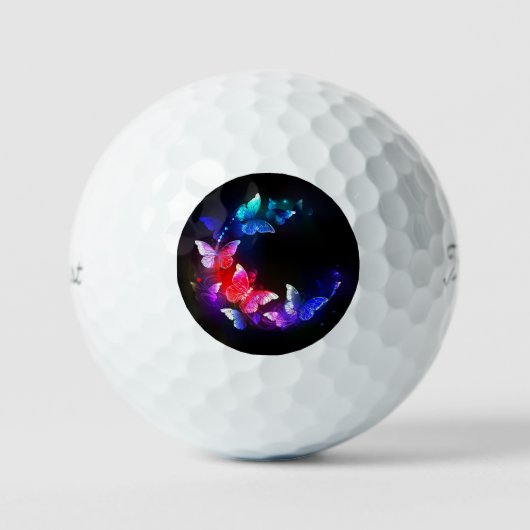 Glühende Neon-Nachtschmetterlinge auf schwarzem Hi Golfball (Vorderseite)