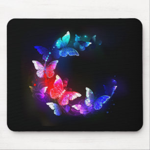 Glühende Neon-Nachtschmetterlinge auf schwarzem Hi Mousepad
