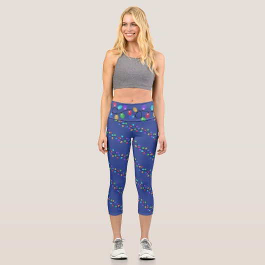 Glühende Weihnachts-Lichter auf blau Capri Leggings (Vorderseite)