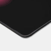 Glühender rosa Effekt auf schwarz Schreibtischunterlage (Ecke)