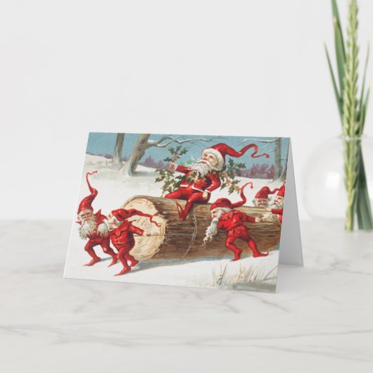 Gnomes dragging a cut tree trunk through the snow karte (Vorderseite)