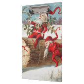 Gnomes dragging a cut tree trunk through the snow klemmbrett (Links)