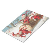 Gnomes dragging a cut tree trunk through the snow notizblock (angewinkelt)