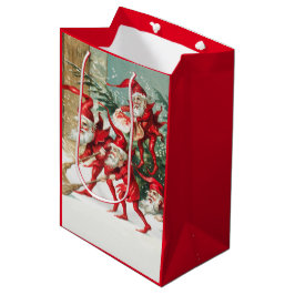 Gnomes sweeping snow with a broom mittlere geschenktüte