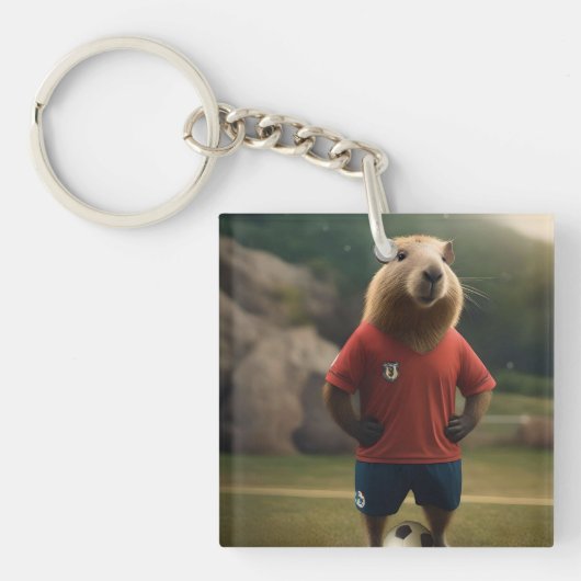 "Goal-Scoring Capybara: Der ultimative Fußballstar Schlüsselanhänger (Vorderseite)