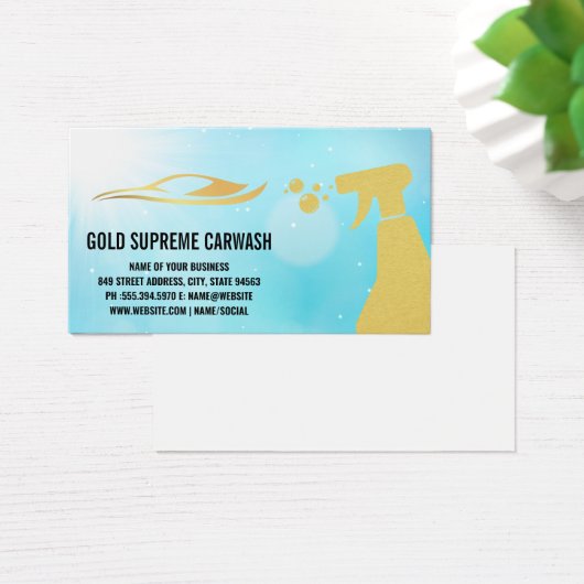 Gold-Auto-Logo und Sprayflasche (Schreibtisch)