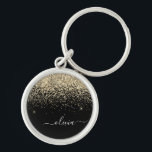 Gold Black Glitzer Script Monogram Girlaname Schlüsselanhänger<br><div class="desc">Monogram Name Keychains (Key Chain): Gold und Black Sparkle Glitzer Script. Das macht den perfekten 16 Geburtstag,  Hochzeit,  Brautparty,  Jubiläum,  Babydusche oder Junggeselinnen-Abschied Geschenk für jemanden,  der Lieben glamourösen Luxus und schicke Stile.</div>