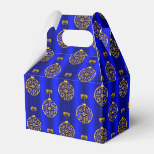 Gold Christmas Baubles auf Blue Geschenkschachtel