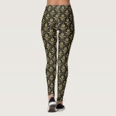 Gold Damask Muster auf schwarzem Hintergrund Leggings (Rückseite)