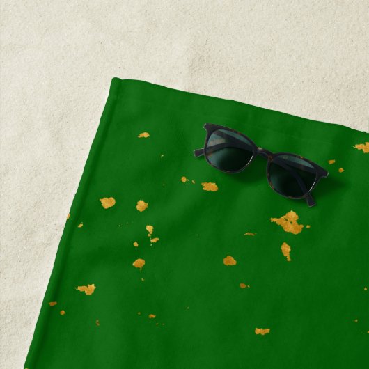 Gold Flakes auf Smarald Green Strandtuch (Beispiel)