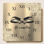 Gold Glitter Sparkle Eyelashes Monogram Name Quadratische Wanduhr<br><div class="desc">Gold Faux Foil Metallic Sparkle Glitter Brushed Metal Monogram Name and Initial Eyelashes (Lashes),  Eyelash Extensions and Eyes cute wall clock. The design makes the perfect sweet 16 birthday,  wedding,  bridal shower,  anniversary,  baby shower or bachelorette party gift for someone looking for a trendy cool style.</div>