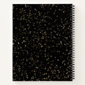 Gold Glitzer Staub auf schwarz Notizblock (Rückseite)