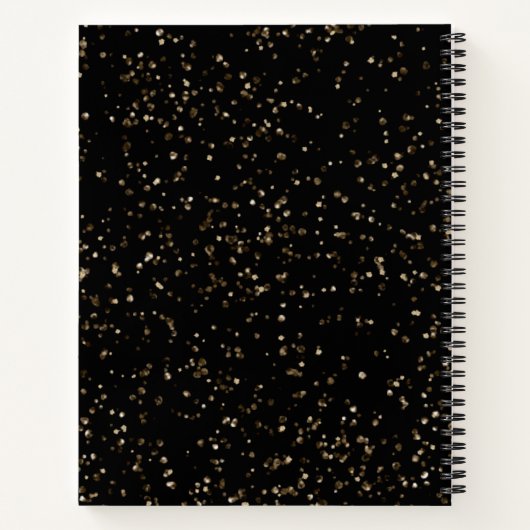 Gold Glitzer Staub auf schwarz Notizblock (Rückseite)