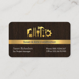 Gold Handyman Tools auf Holzebene Visitenkarte