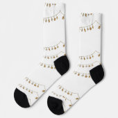 Gold hängen Weihnachtsschmuck auf weißen Socken (Linkes Detail)