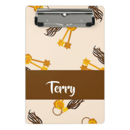 Gold house keys on pink mini klemmbrett