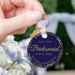 Gold Lace Bridesmaid Wedding Gift Navy Blue Schlüsselanhänger<br><div class="desc">These keychains are designed to give as favors to bridesmaids in your wedding party. They feature a simple yet elegant design with a navy blue background,  gold lettering,  and a golden faux foil floral lace border. Perfect way to thank your bridesmaids for being a part of your special day!</div>