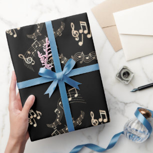 Gold-Musiknoten auf schwarzem Medium Geschenkpapier