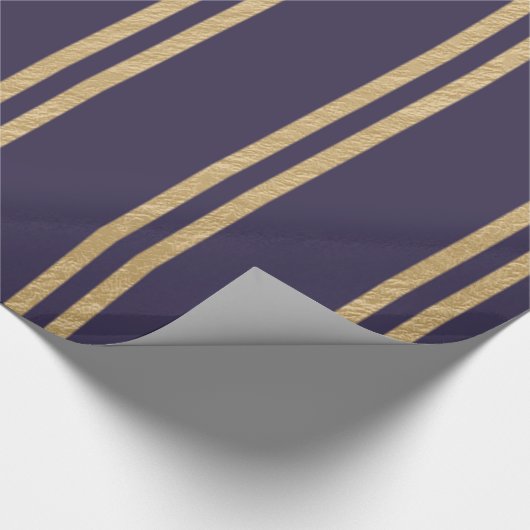 Gold Nugget Streifen auf einem dunkelblauen Hinter Geschenkpapier (Ecke)