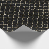 Gold-Quatrefolie auf Schwarz Geschenkpapier (Ecke)