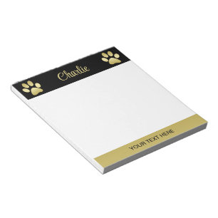 Gold Shiny Dog Paw auf schwarzem Hintergrund Notizblock